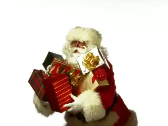 Santa Claus with bunch of gifts