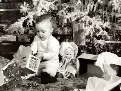 Baby is opening the gifts
