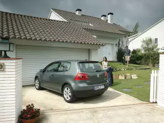 Volkswagen Golf V: Parked Elegance in Front of the House