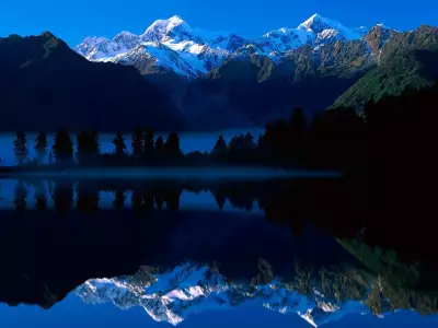 Lake Matheson Reflects Mount Tasman And Mount Cook New Zealand