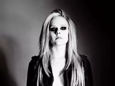 Avril Lavigne black and white portrait: Timeless elegance in monochrome beauty