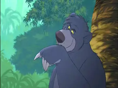 Baloo smiling and playfully pointing in The Jungle Book 2