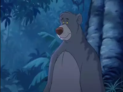 Baloo standing under the moonlit jungle from The Jungle Book 2