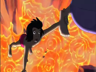 Mowgli hanging over a pit of fire from The Jungle Book 2