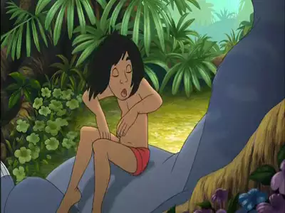 Mowgli stretching and yawning while lying on Baloo in The Jungle Book 2