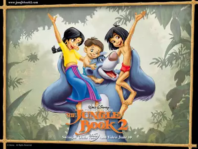 Mowgli, Shanti, and Ranjan happily riding on Baloo in The Jungle Book 2