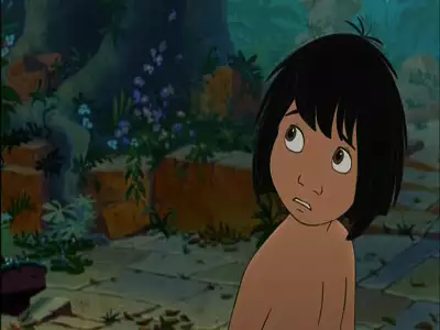 Mowgli looking up with an uncertain expression in The Jungle Book 2