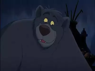 Baloo looking surprised in a dimly lit environment from The Jungle Book 2