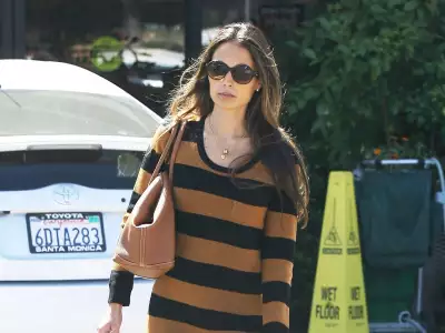 Jordana Brewster in Los Angeles wearing stylish black and brown pullover
