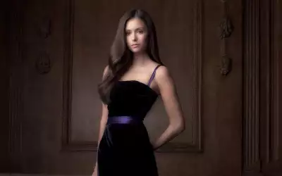 Nina Dobrev captivating in an elegant black dress on the red carpet