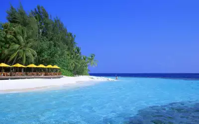 Breathtaking view of Maldives Paradise Island, showcasing pristine beaches and crystal-clear waters