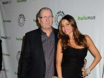 Sofia Vergara and Ed O'Neill posing together on the red carpet at PaleyFest