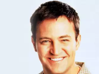 Young and Smiling: Matthew Perry Wallpaper