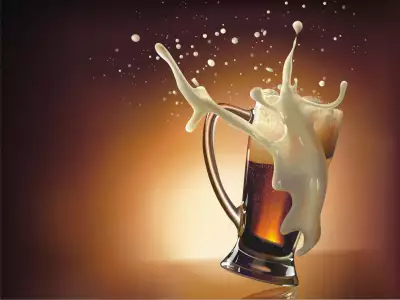 A captivating beer wallpaper featuring a perfectly poured glass of craft beer