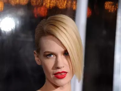 Close-up of January Jones showcasing a bold red lipstick look