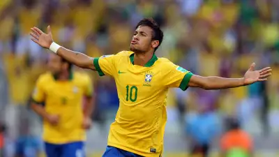 Neymar Celebrating a Goal in Brazilian National Team Wallpaper